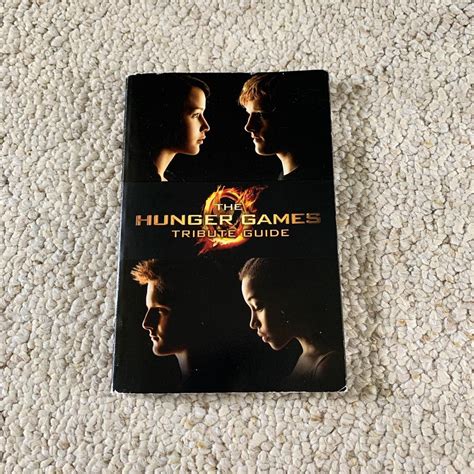 The Hunger Games Tribute Guide Book Hungergames Depop The Hunger Games Tribute Guide Book Hungergames Depop